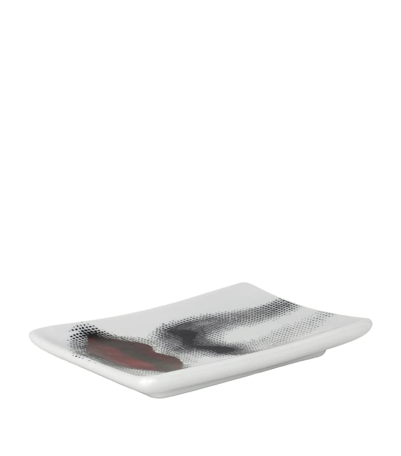Fornasetti rectangular porcelain ashtray with whimsical design - British product
