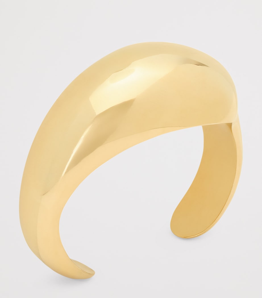 Saint Laurent brass teardrop dome cuff, UK version