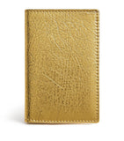 Comme des Garçons vertical card holder with gold metallic accent, imported from the UK