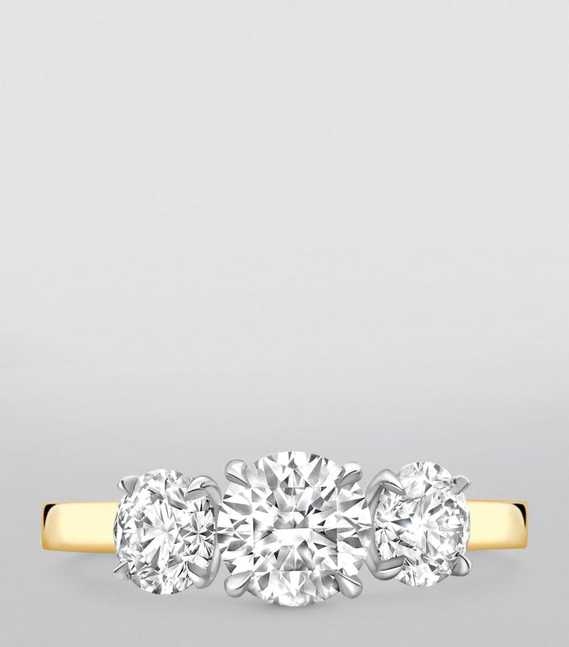 Boodles yellow gold platinum three stone diamond engagement ring, UK version