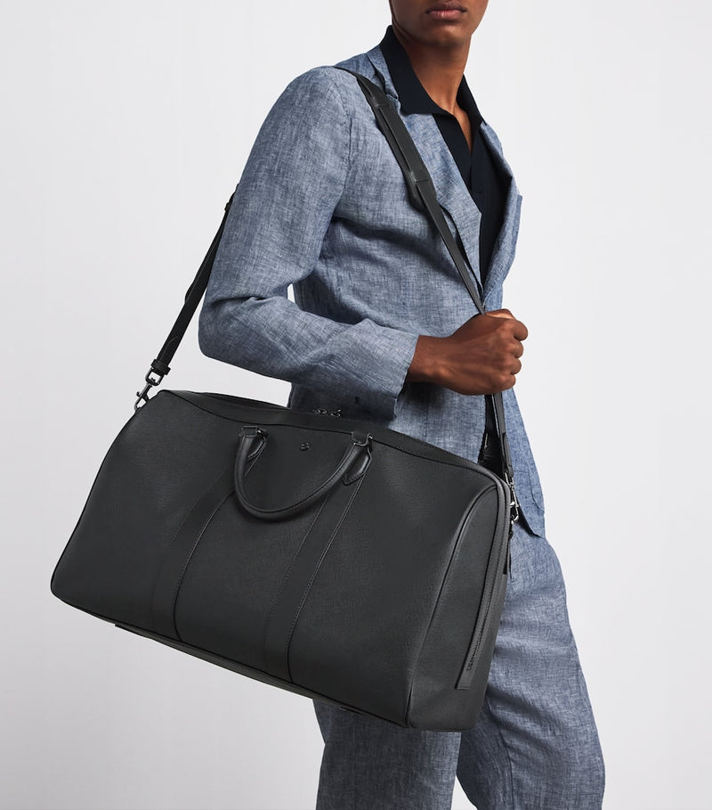 Harrods leather holdall with gunmetal hardware, imported from the UK