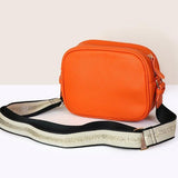 POM vegan leather camera shoulder bag orange, imported from the UK