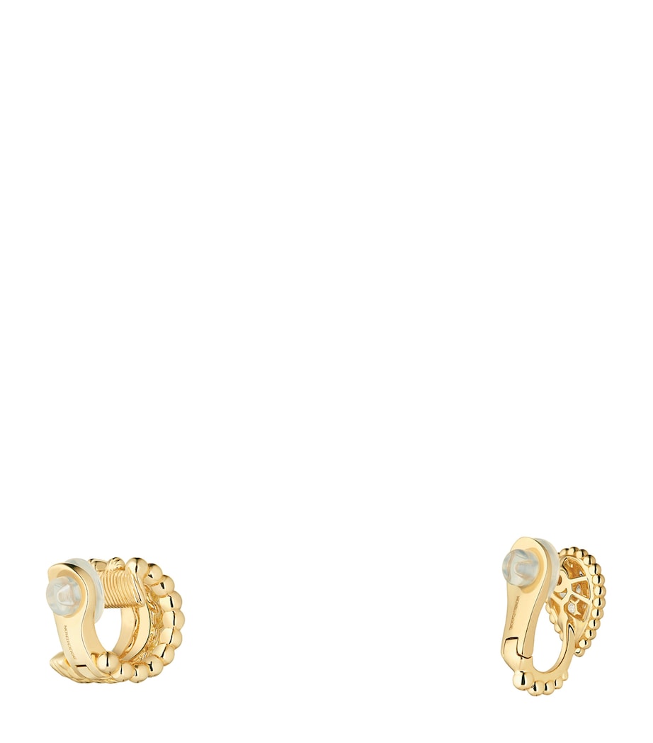 Boucheron yellow gold Serpent Bohème asymmetric clip-on earrings, imported from the UK
