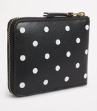 Comme des Garçons polka-dot calfskin wallet (British brand)
