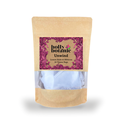 Holland & Barrett Holly Botanic Unwind Tisane Lemon Balm and Hibiscus Herbal Tea 30 Tea Bags- Buy online at McGrocer