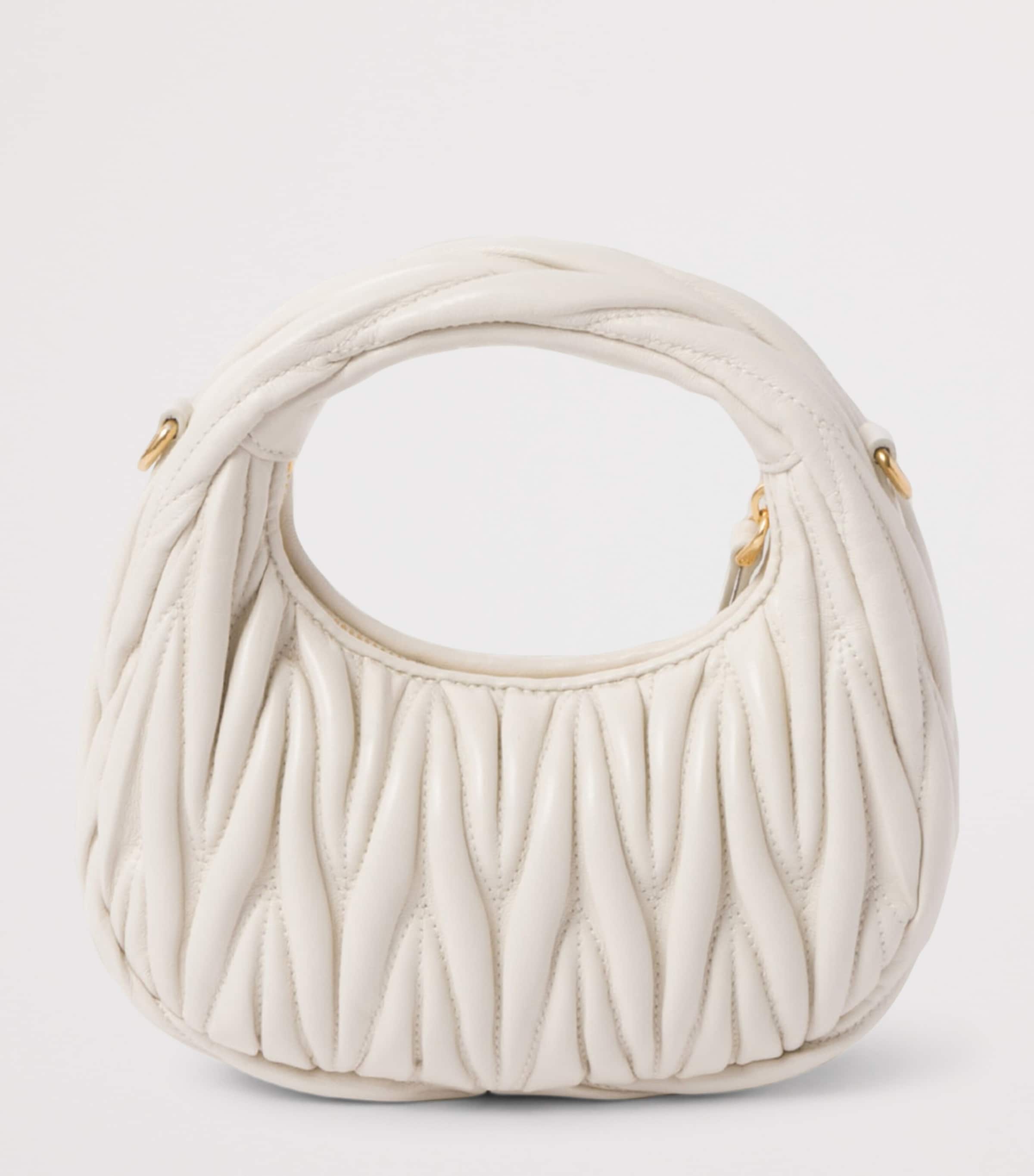 Miu Miu Wander matelassé leather top-handle bag (British brand)