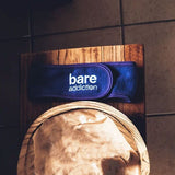 Bare Addiction gift set with toiletry bag, scrubber and headband (British brand)