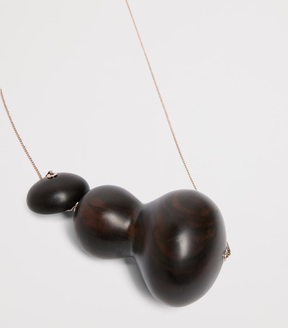 Max Mara ebony pendant necklace gold-tone chain, imported from the UK