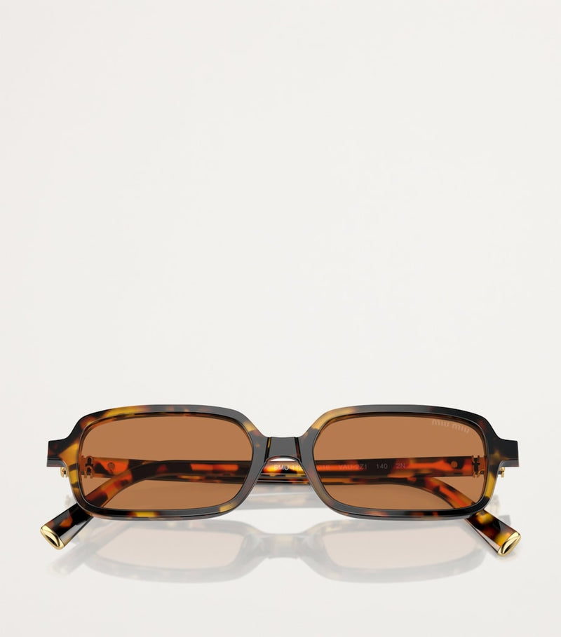 Miu Miu designer sunglasses tortoise shell brown, imported from the UK