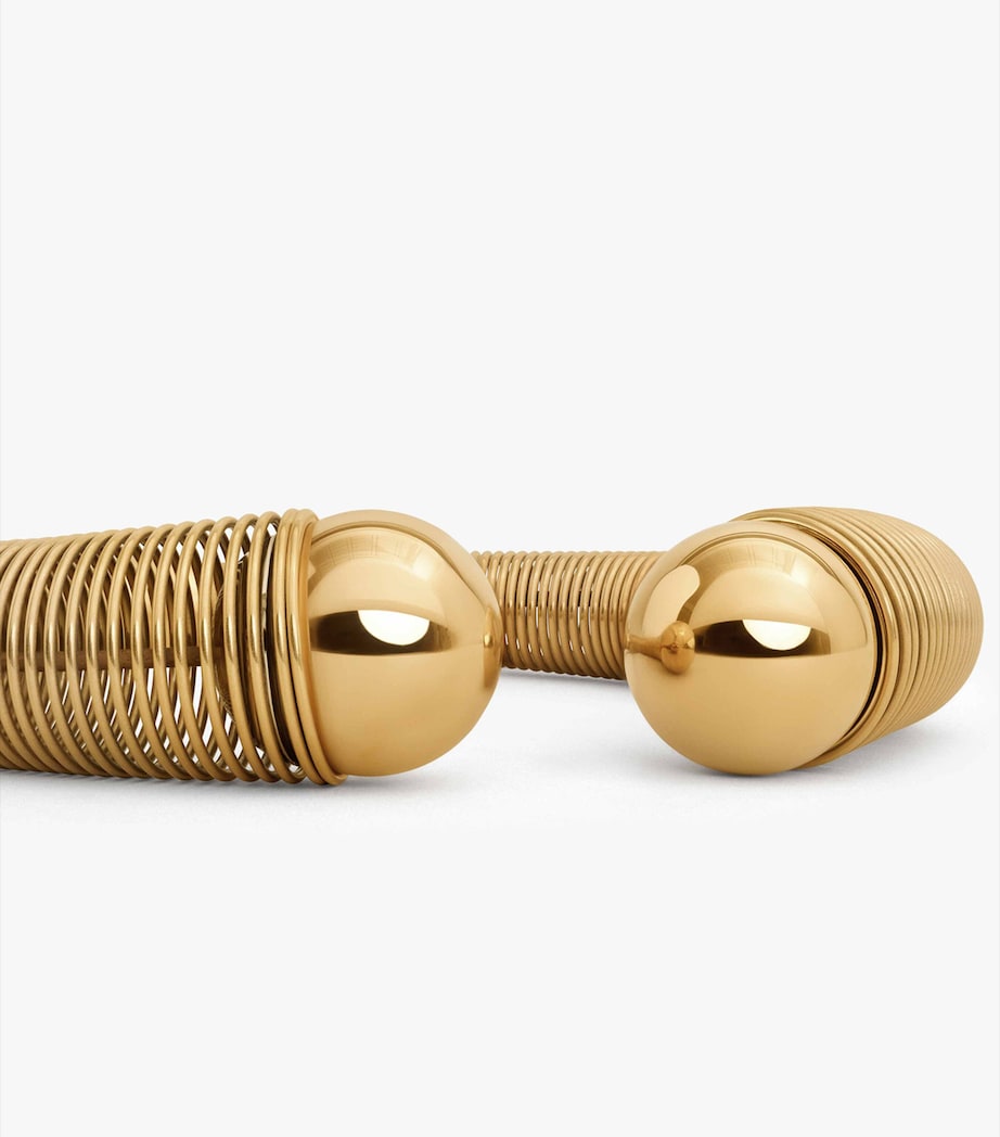 Alaïa spiral gold-tone choker with metal beads, imported from the UK