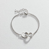 Revere sterling silver two hearts hug bracelet UK version