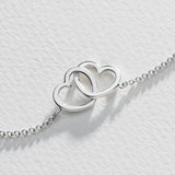 Revere sterling silver two hearts hug bracelet UK version