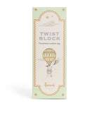 Harrods wooden twist block toy with three illustrated pastel prints, UK version