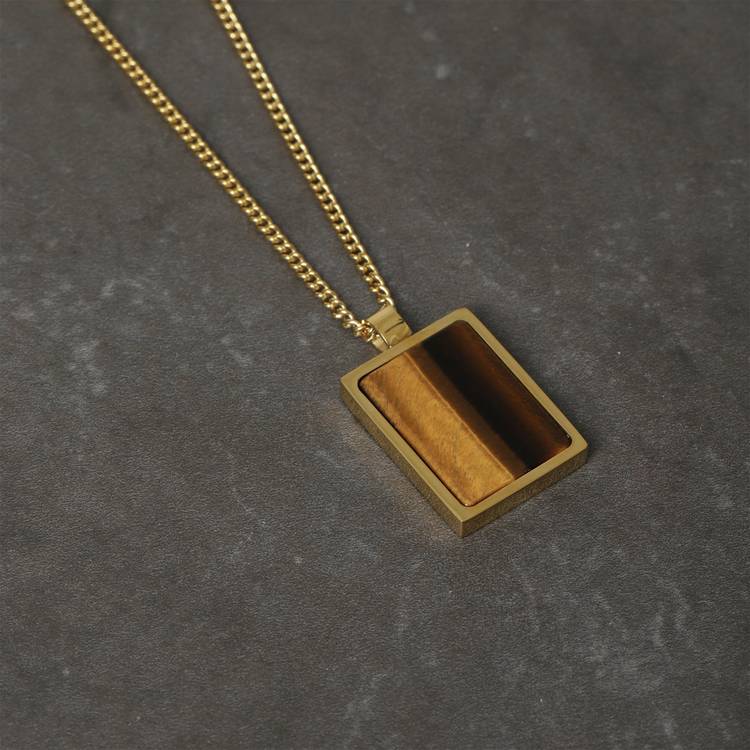Uncommon Souls gold tone rectangular pendant necklace, imported from the UK