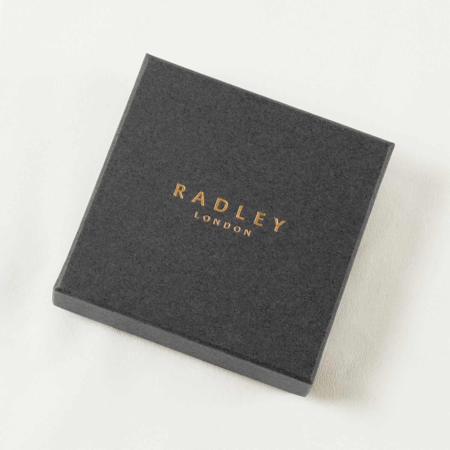 Radley gold plated triple heart necklace, imported from the UK