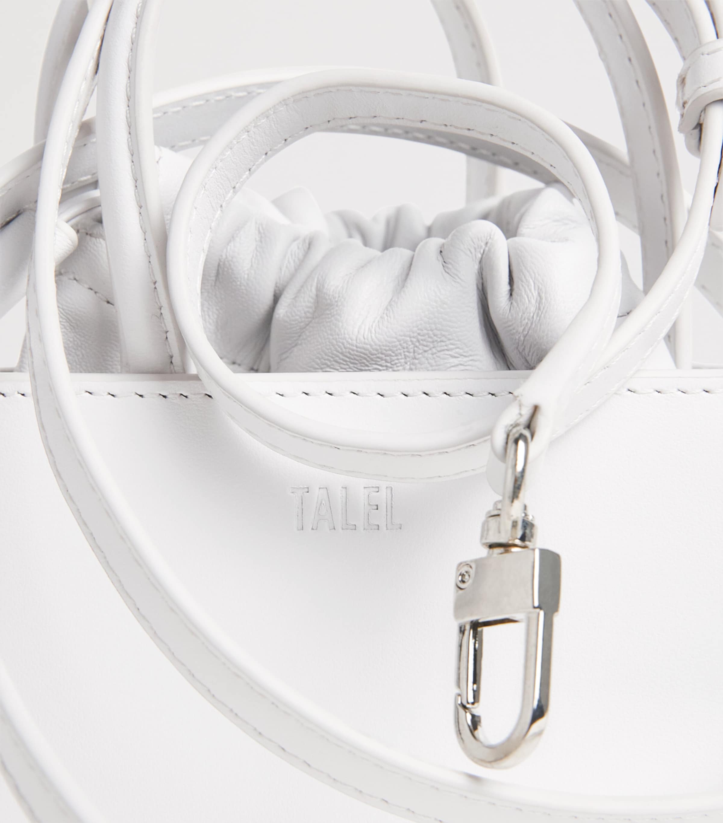 Talel small triangle leather handbag, imported from the UK