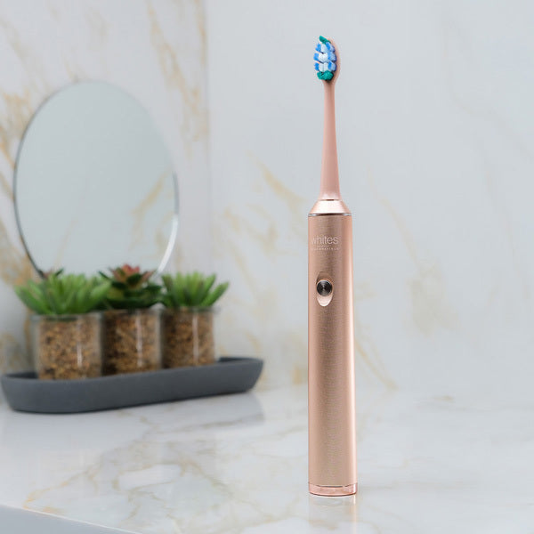 Whites Beaconsfield rose gold sonic electric toothbrush, imported from the UK