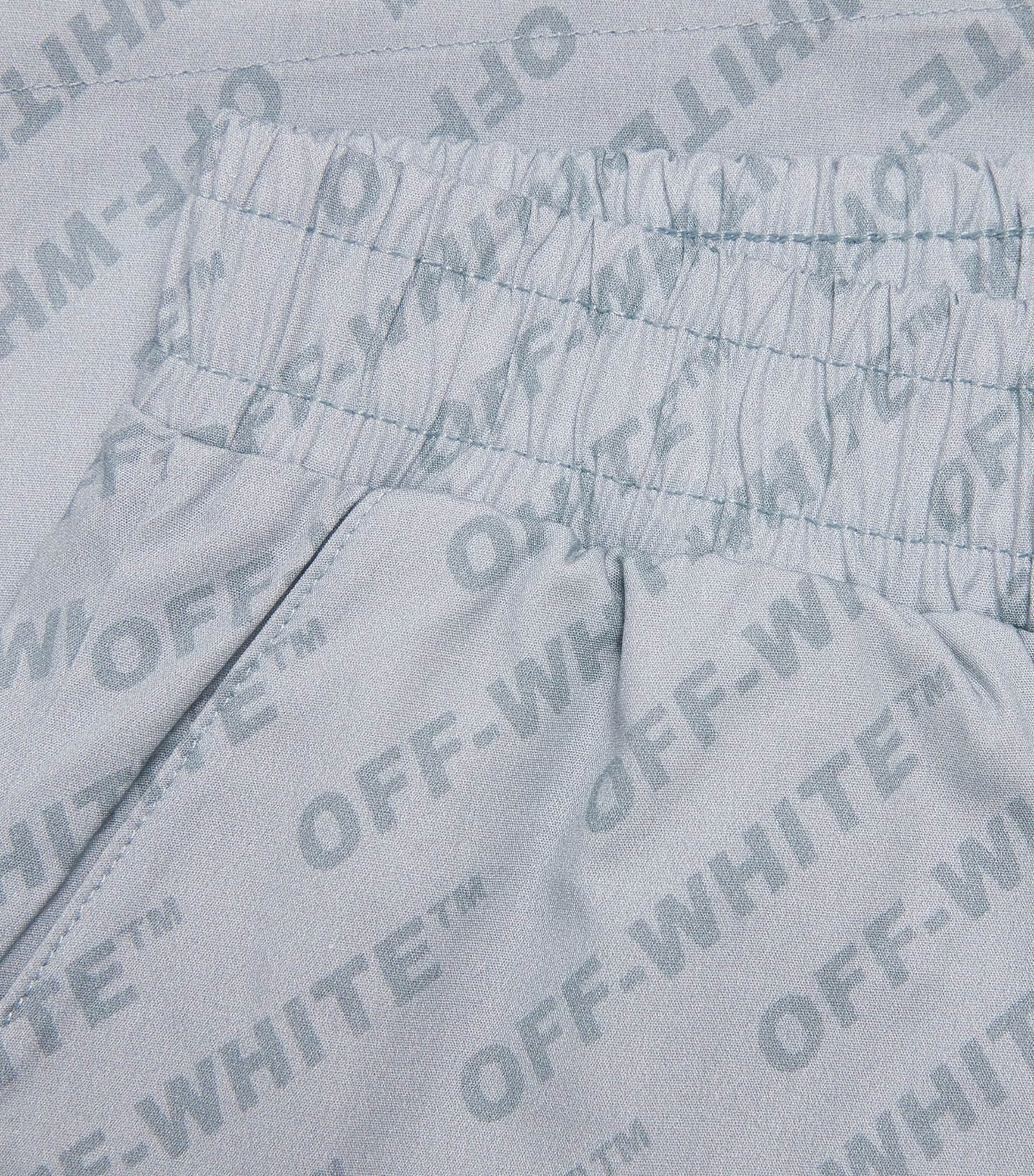 Off-White kids bowling shorts with logo for ages 4-12+, imported from the UK