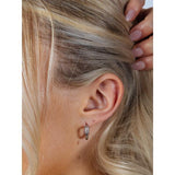 SVNX crystal huggie hoops in silver stainless steel (British brand)