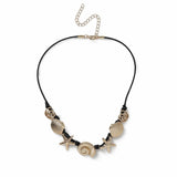 Revere gold-tone shell and starfish necklace on black cord (British brand)