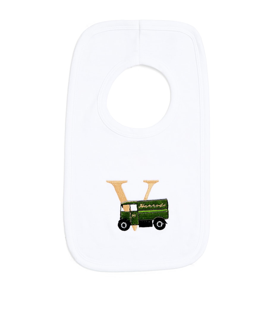 Paint My Dreams cotton V monogram baby bib, imported from the UK