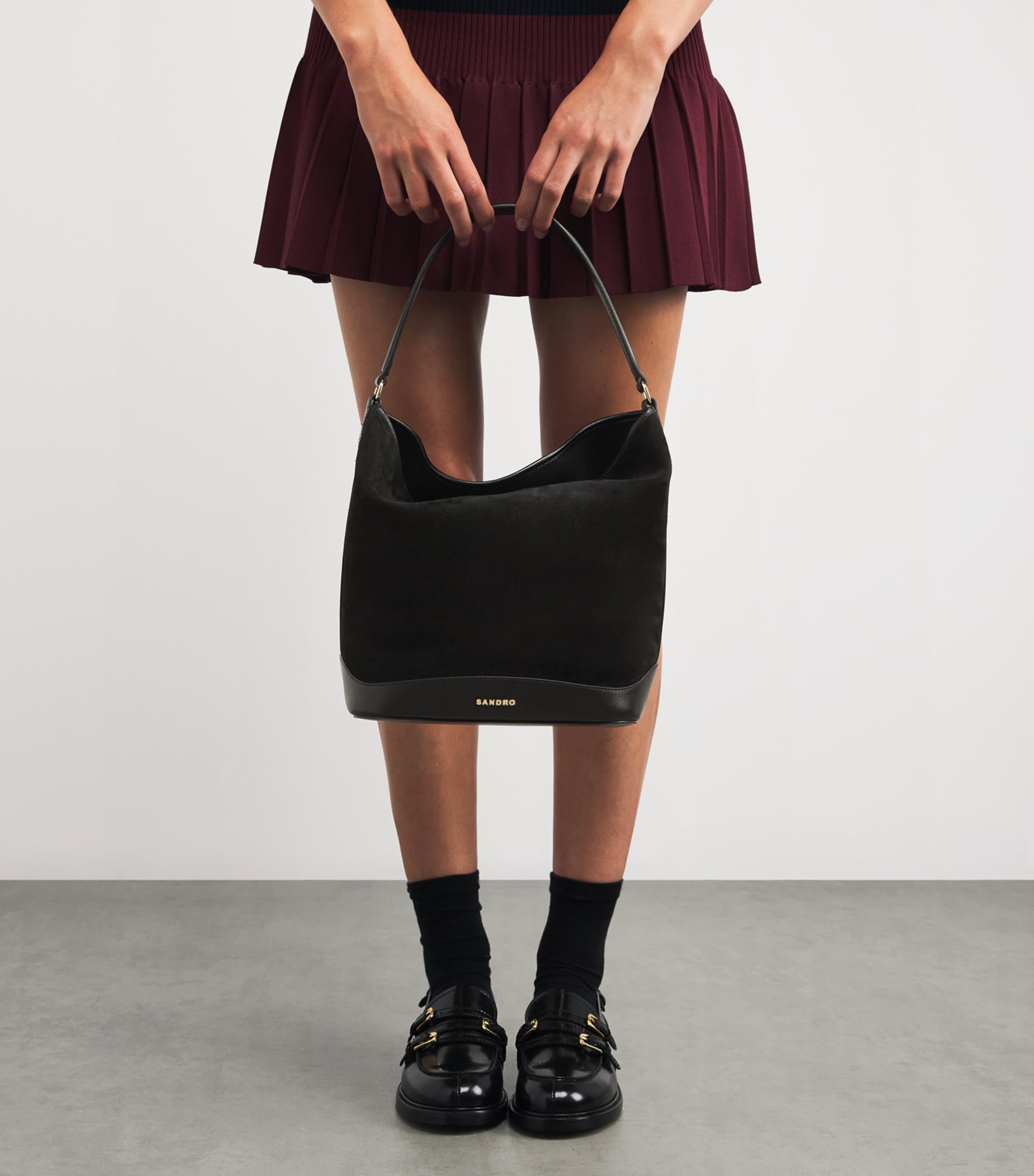 Sandro Paris suede Tangoso bucket bag with gold-tone hardware - British product