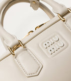 Miu Miu Arcadie top-handle leather bag, imported from the UK