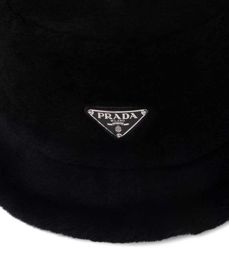 Prada shearling bucket hat with iconic Triangle logo, imported from the UK