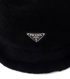 Prada shearling bucket hat with iconic Triangle logo, imported from the UK