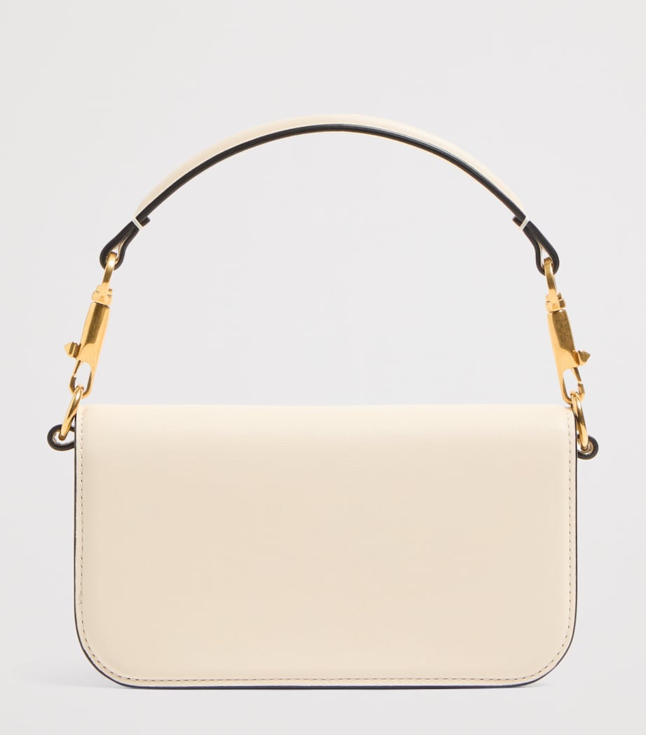 Valentino Garavani Small Embellished Locò shoulder bag, imported from the UK