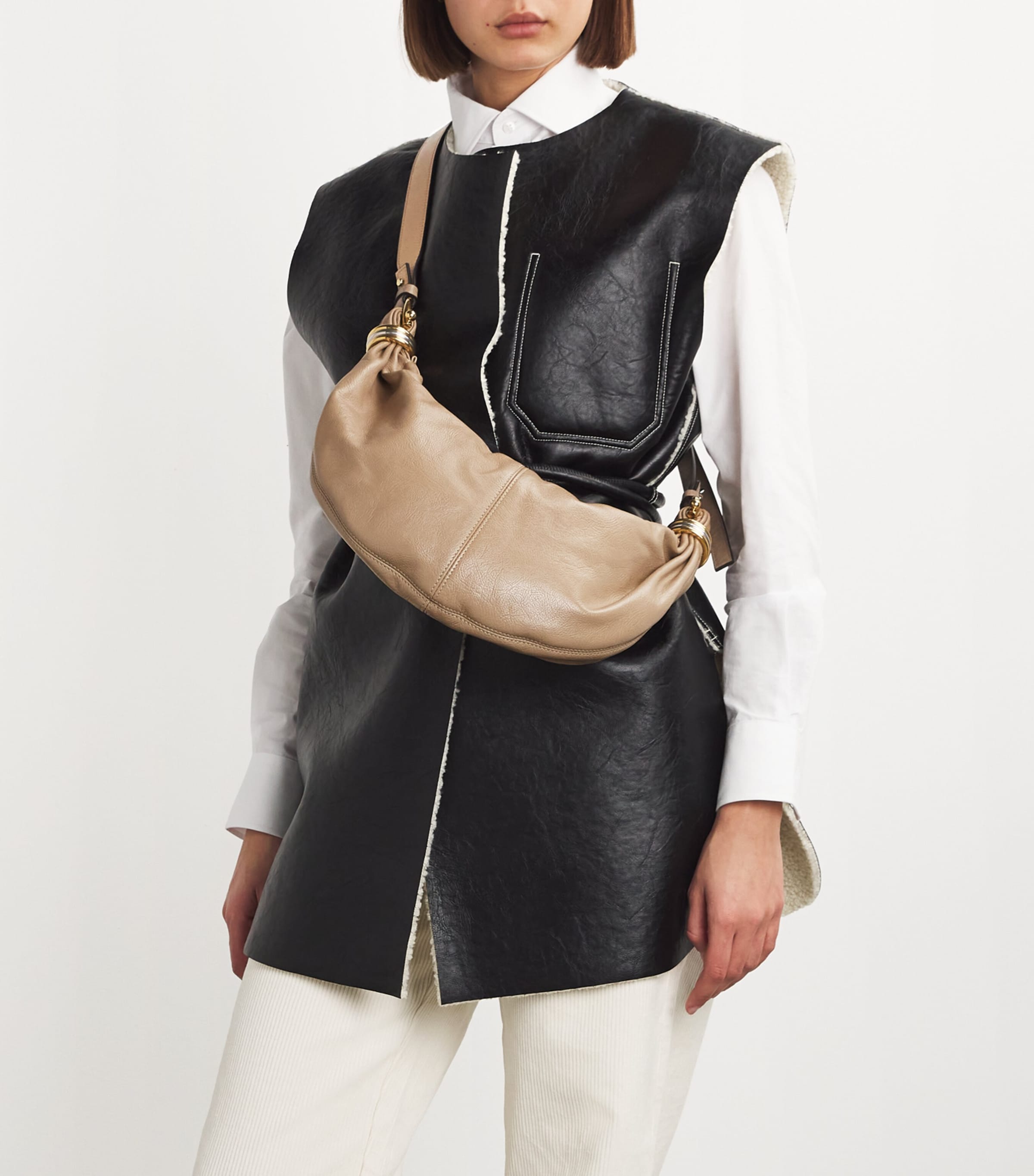 Chloé small leather bracelet bag with gold-tone handle (British brand)