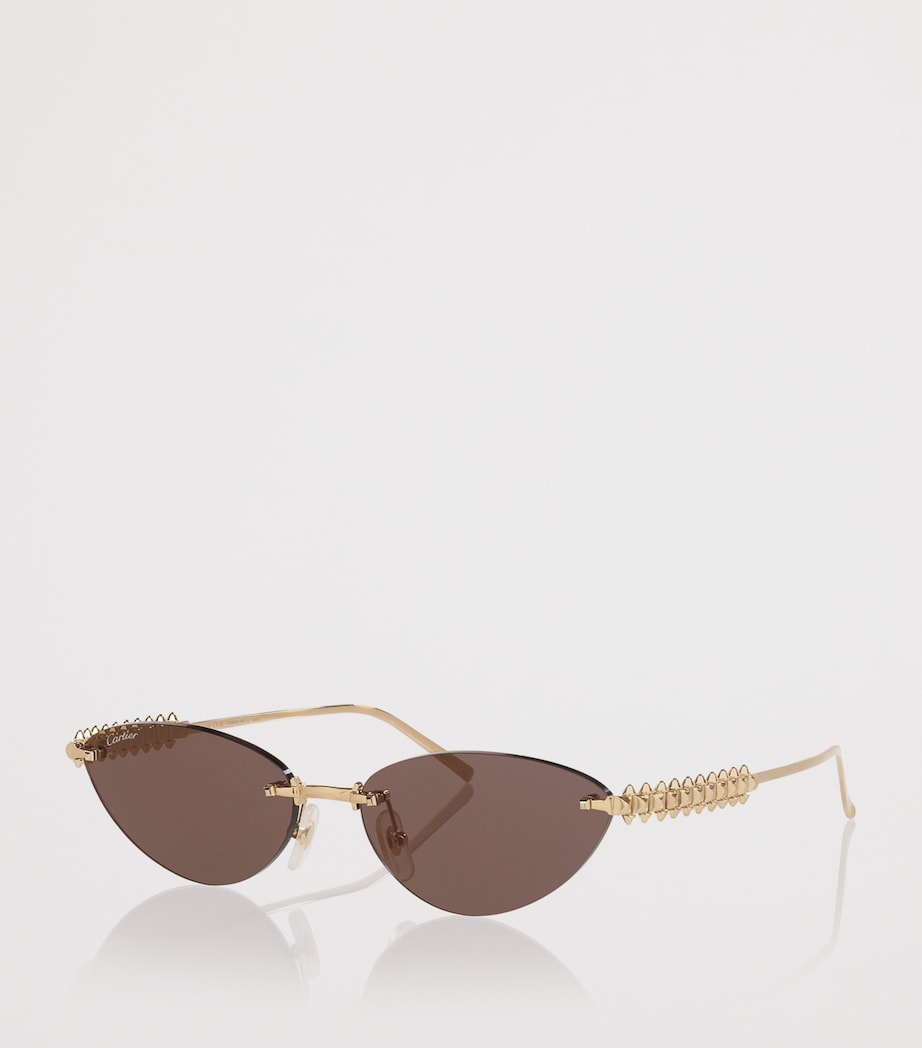 Cartier cat-eye sunglasses with gold-tone metal frames - British product