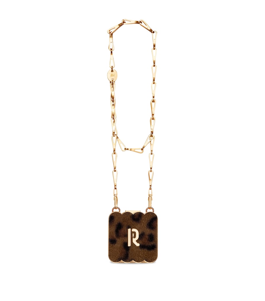 Rabanne antique gold luminizer 9.1g and leopard clutch bag, UK version