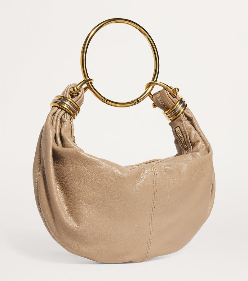 Chloé small leather bracelet bag with gold-tone handle (British brand)