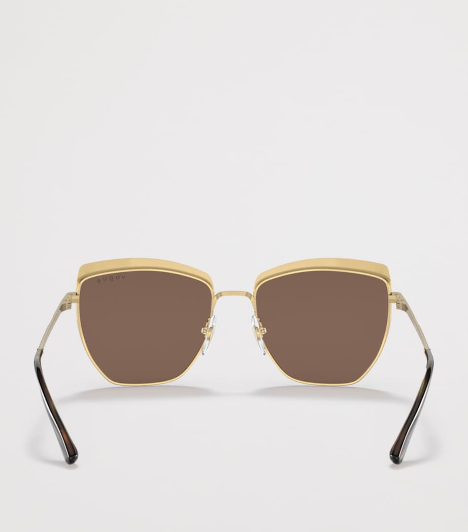 Vogue metal irregular sunglasses with oversized cat-eye design, UK version