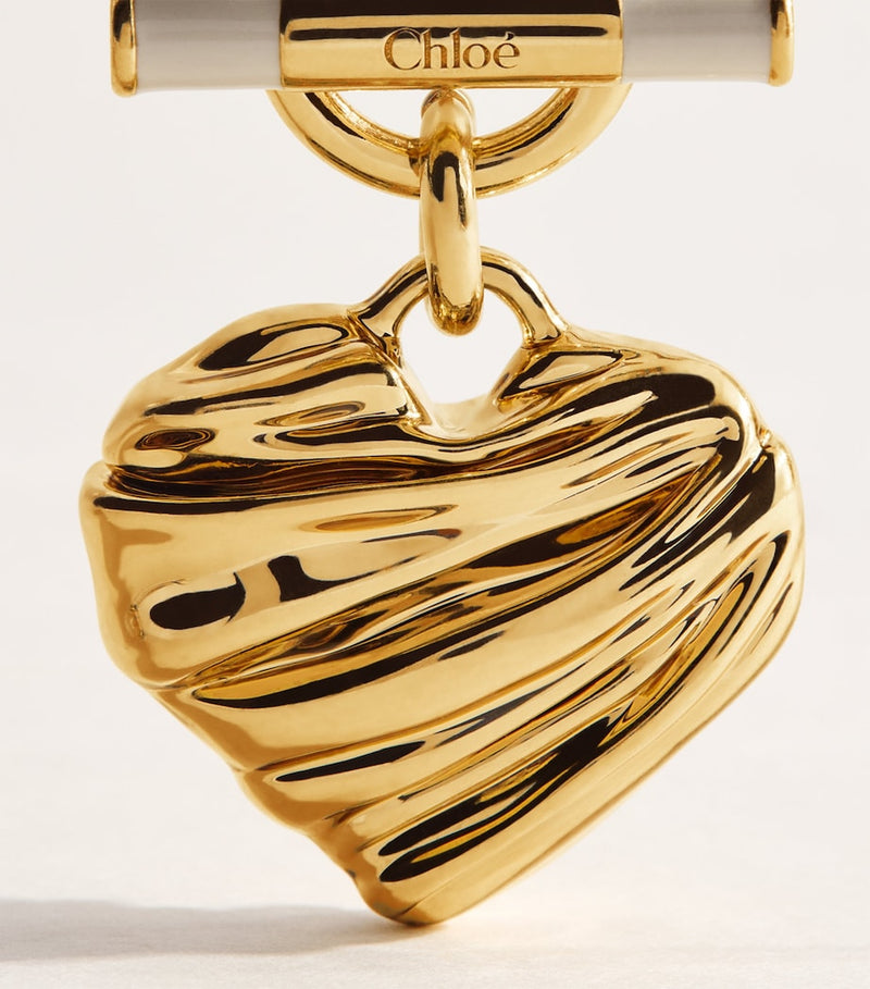 Chloé T-Bar Heart Drop Earrings in brass, UK version