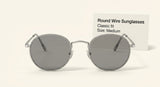 Gucci GG1875S oval-frame metal sunglasses, imported from the UK