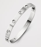 Cartier medium white gold diamond LOVE bracelet, UK version