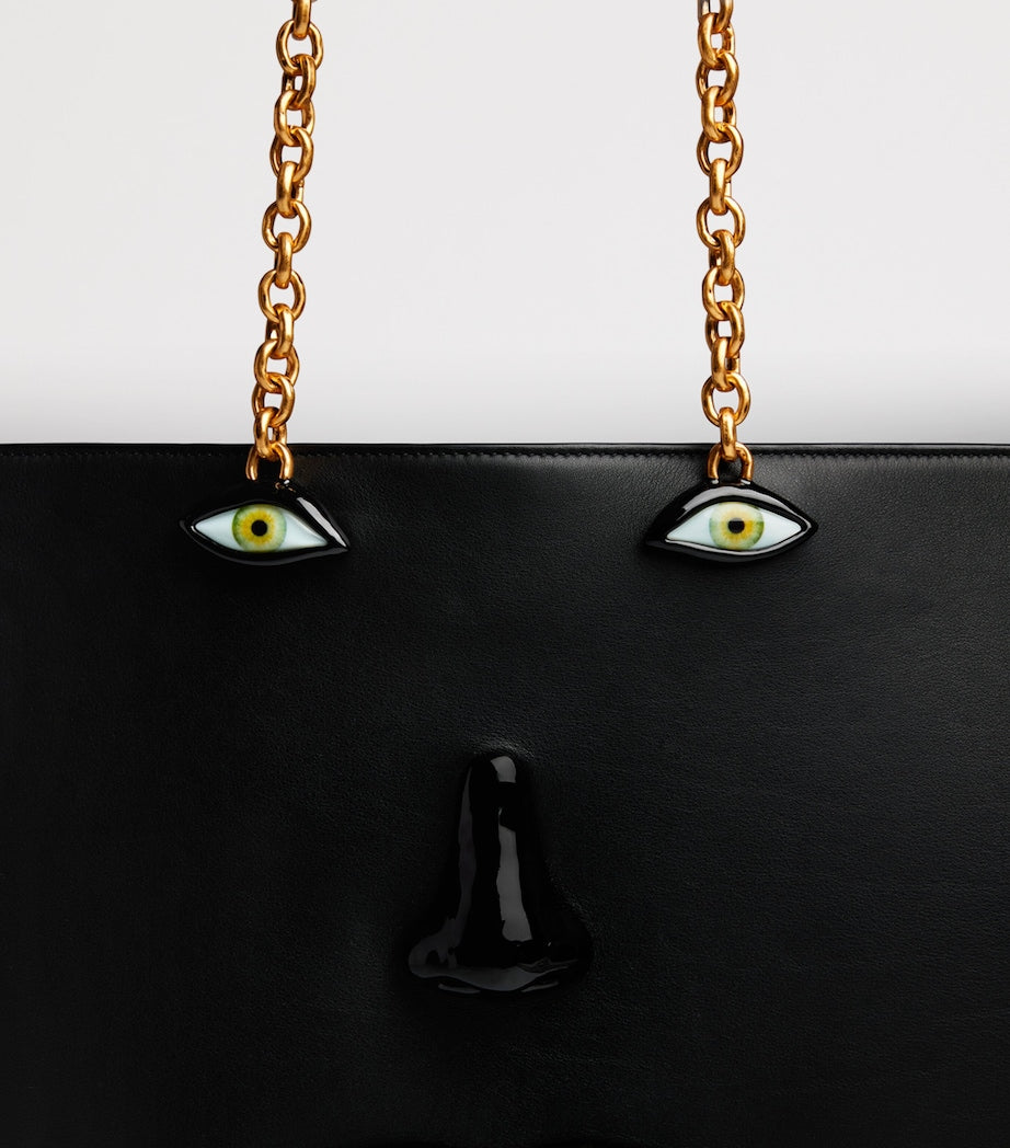 Schiaparelli calfskin face tote bag with anatomical details (British brand)