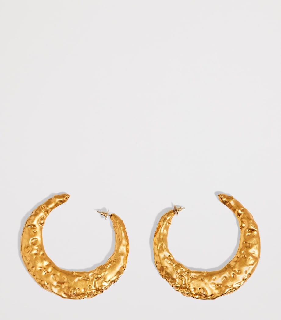 Schiaparelli mother-of-pearl hoop earrings (British brand)