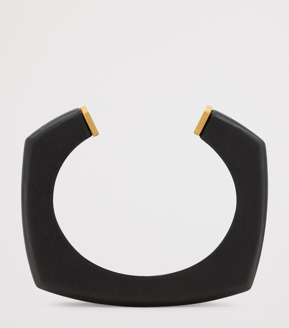 Saint Laurent leather cuff bracelet with gold-tone tip - British product
