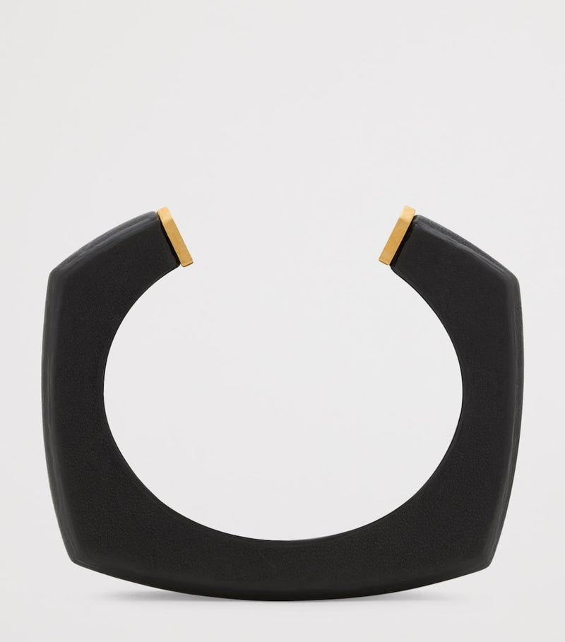 Saint Laurent leather cuff bracelet with gold-tone tip - British product