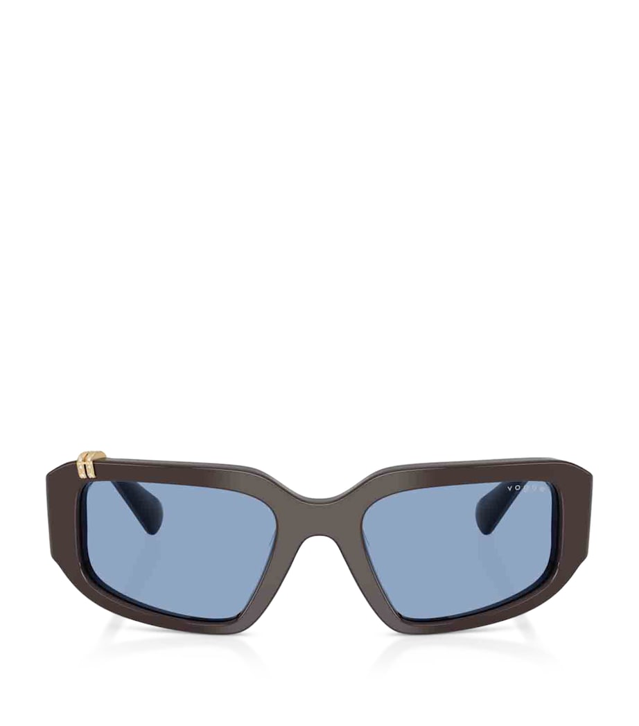 Vogue rhinestone irregular sunglasses with blue-tint lenses (British brand)