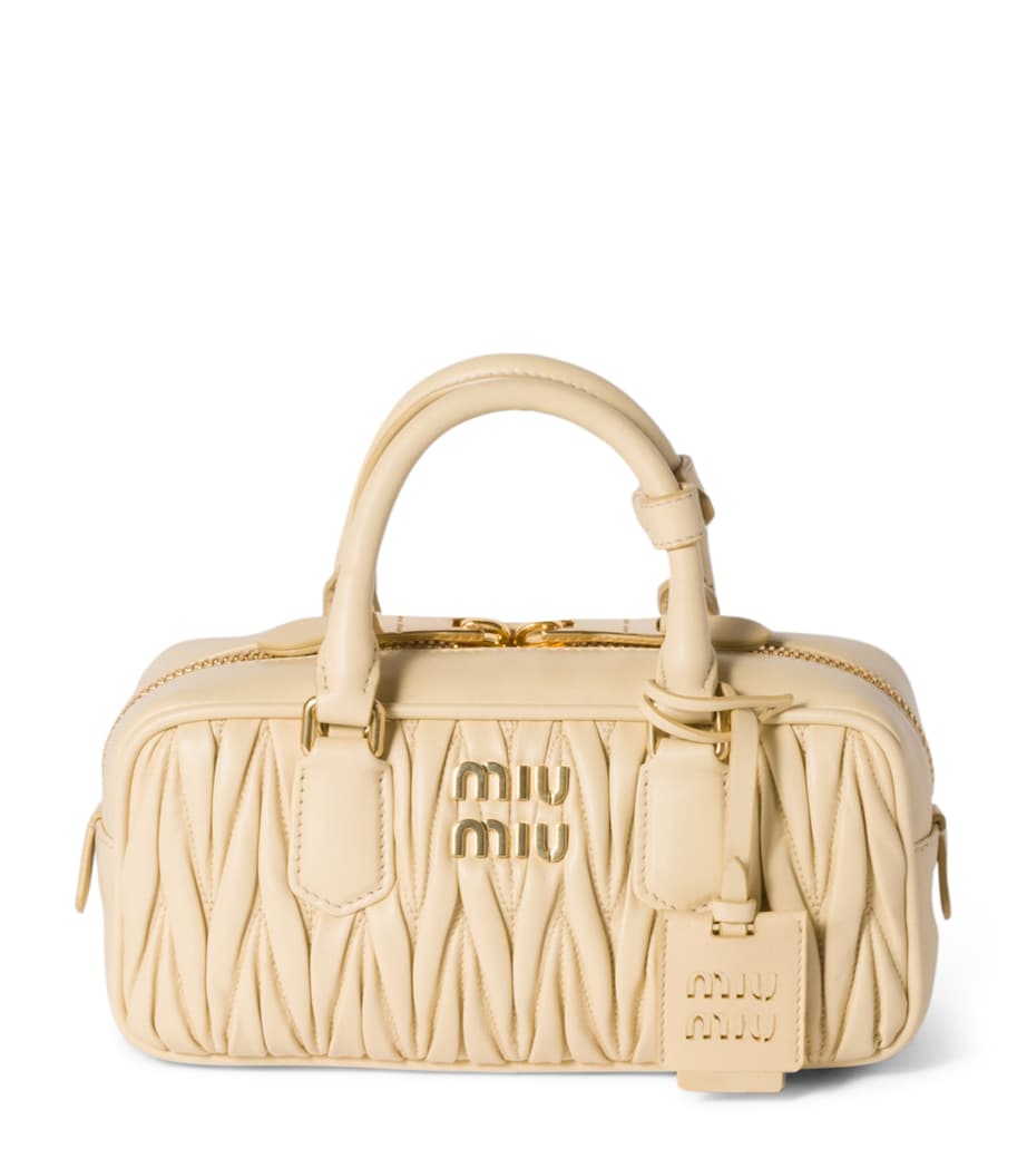 Miu Miu Arcadie matelassé leather top-handle bag, imported from the UK