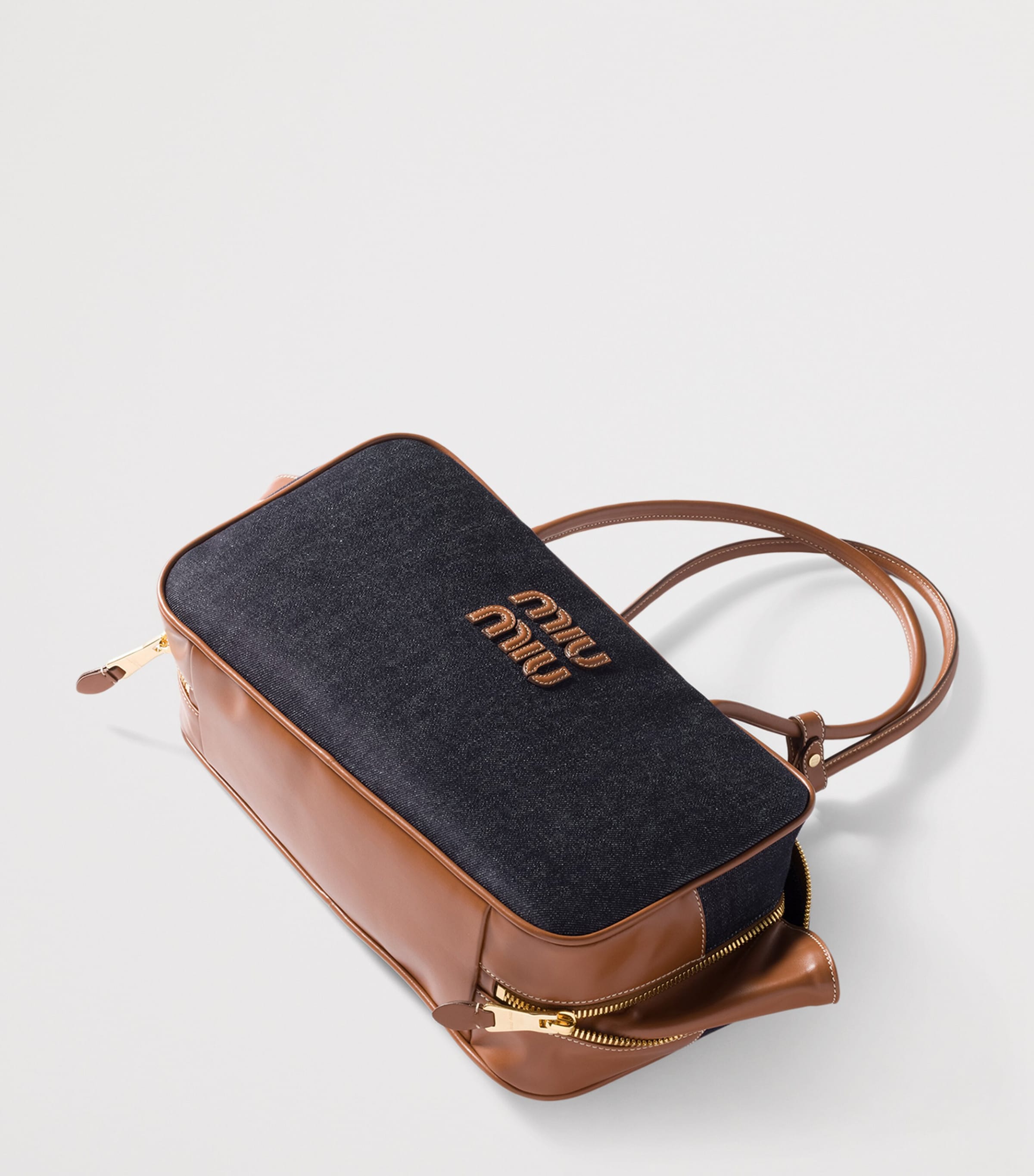 Miu Miu Beau denim top-handle bag with calf leather trims (British brand)