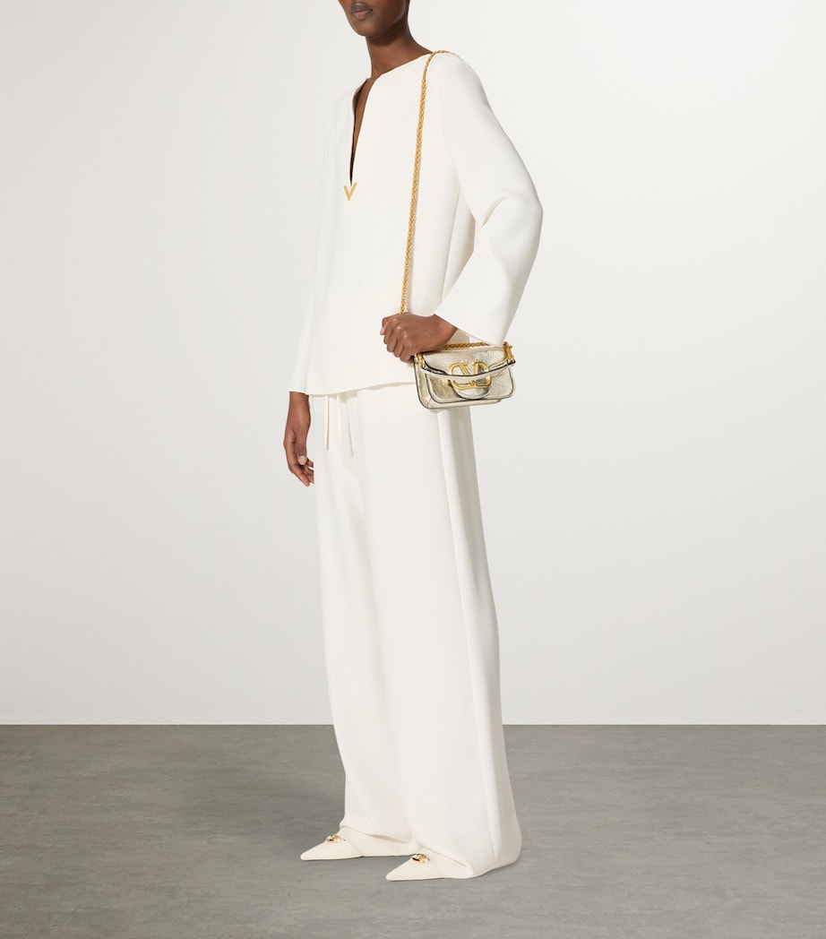 Valentino Garavani small leather Locò shoulder bag, imported from the UK