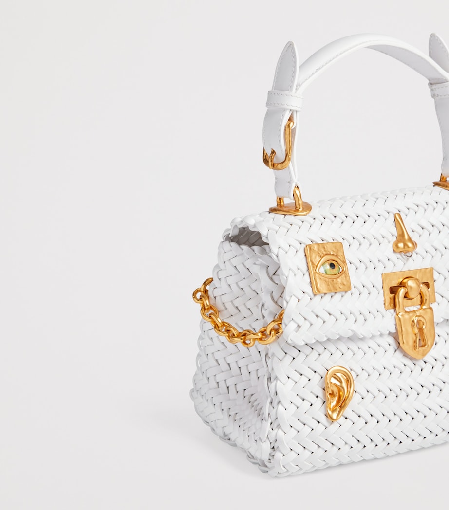 Schiaparelli mini calfskin bijoux secret top-handle bag, imported from the UK