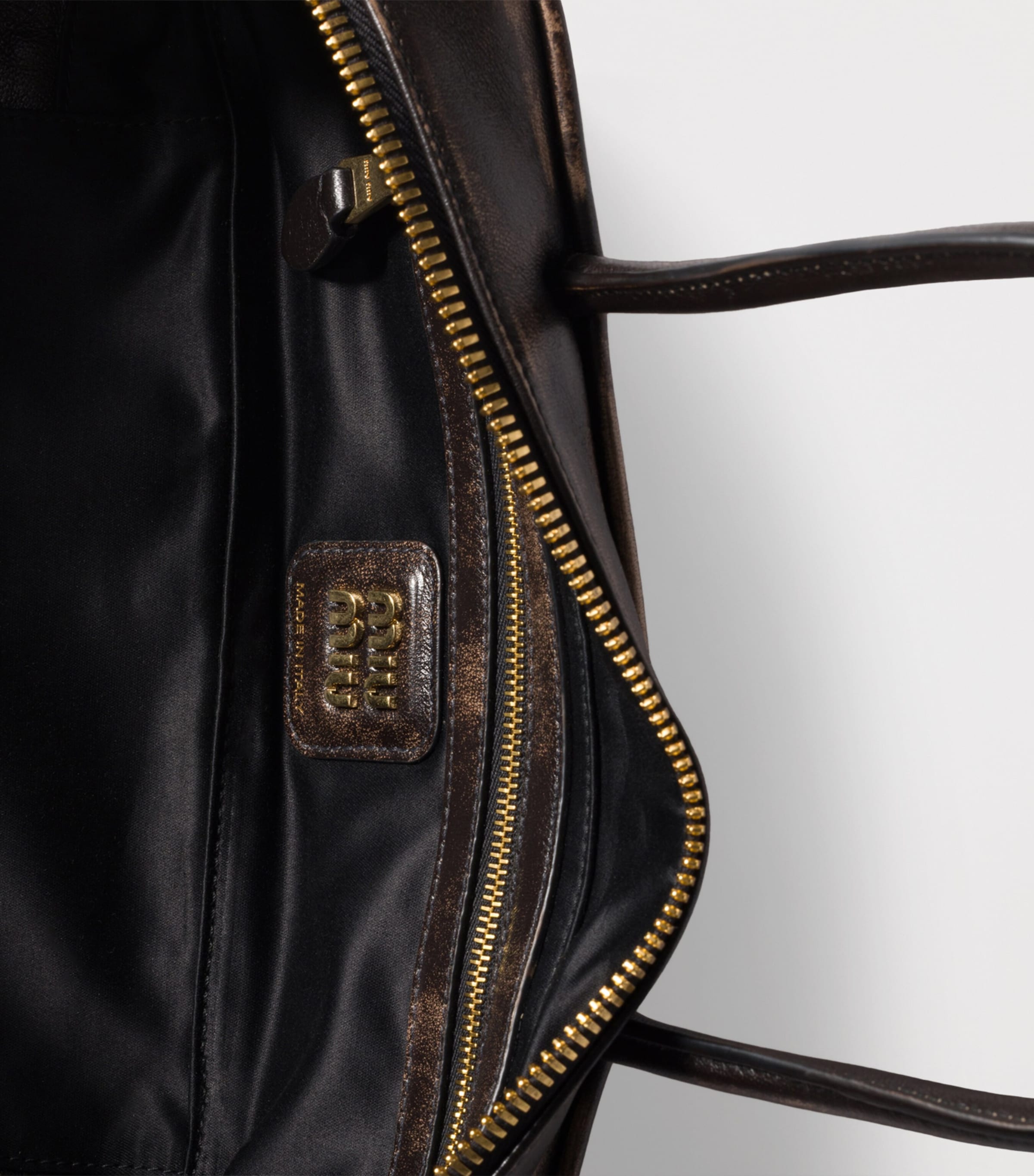 Miu Miu Leather Beau top-handle bag, imported from the UK