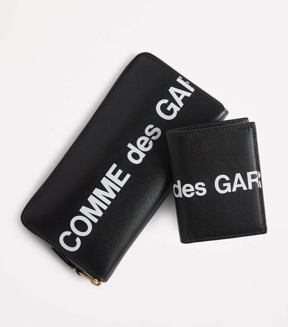Comme des Garçons leather logo print wallet - British product
