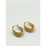 SVNX gold twisted ribbed hoop earrings (British brand)